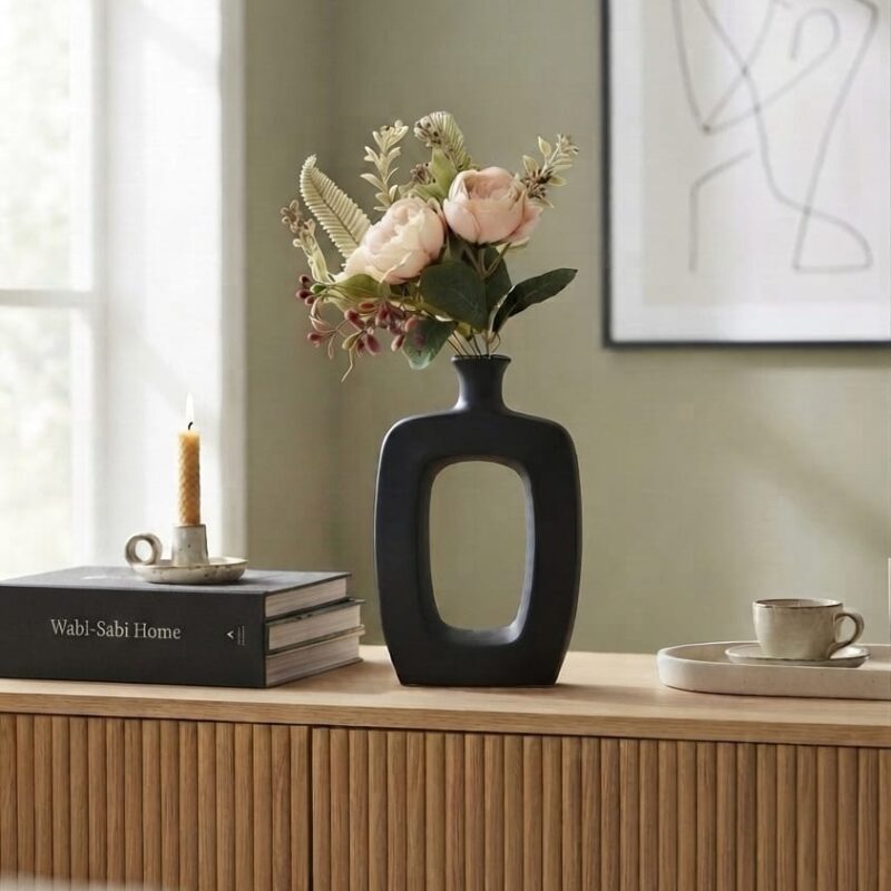 BLACK CERAMIC HOLLOW VASE
