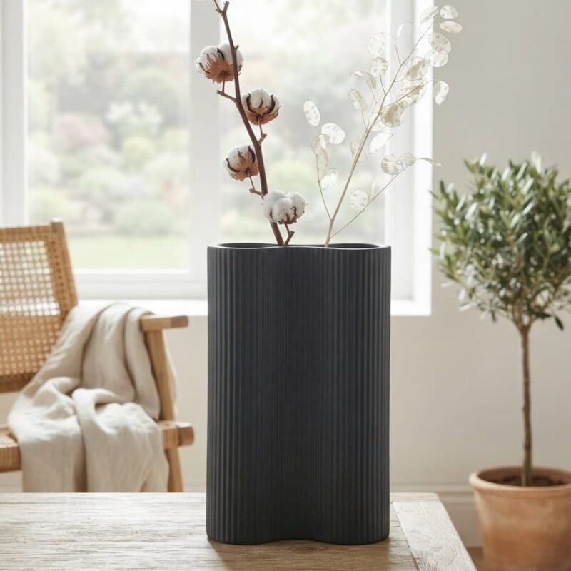 CURVED FLUTED BLACK CERAMIC VASE